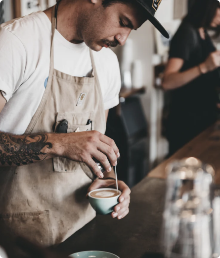 a man making coffee 